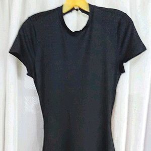 Sexy, silky little black dress with great details, cut outs in back